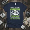I'm a Crazy Grandma quote with a woman taking selfies and photos, on a navy t-shirt