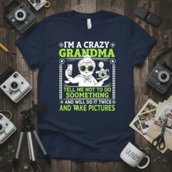I'm a Crazy Grandma quote with a woman taking selfies and photos, on a navy t-shirt