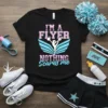 Cheerleader t-shirt with "I'M A FLYER NOTHING Scares me" text and a graphic of a flyer in a split position