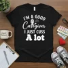 Caregiver t-shirt with white text "I'm a good caregiver I just cuss a lot" and a cute nurse graphic holding