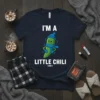 I'm A Little Chili funny t-shirt with a cartoon green chili pepper wearing a blue hat and scarf, shivering