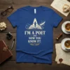 I'm A Poet And Now You Know It text on a blue t-shirt with an open book graphic and a