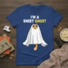 I'm a Sheet Ghost text with a cute cartoon cat wearing a ghost costume on a blue t-shirt