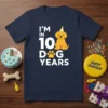 T-shirt with "I'M IN 10 DOG YEARS" text and a cute golden retriever wearing a party hat