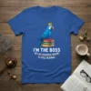 Blue hyacinth macaw wearing a crown sits on books labeled Rules, Eules, Denial; text reads "I'm The Boss But My