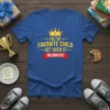 Blue t-shirt with yellow text "I'm the Favorite Child Get Over It No Contest" and a crown graphic