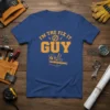Blue t-shirt with orange text "I'm the Fix It Guy" and a graphic of tools and a measuring tape