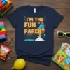 Navy t-shirt with "I'm the Fun Parent" text, rocket graphic, and swing set illustration