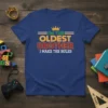 I'm The Oldest Brother I Make The Rules text design with a crown graphic on a royal blue t-shirt