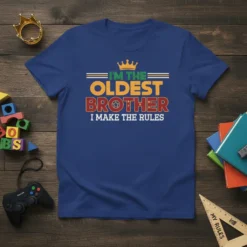 I'm The Oldest Brother I Make The Rules text design with a crown graphic on a royal blue t-shirt