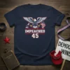 Navy blue t-shirt featuring an eagle holding a gavel and American flag, with text "IMPEACHED 45" below