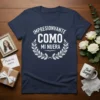 T-shirt with white text "Impresionante Como Mi Nuera" inside a laurel wreath, navy blue background