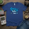 Impulse pixel art t-shirt design with retro joystick and game controller, featuring blue graffiti-style text