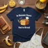 Navy t-shirt with text "In Banana Years You're Bread" and a cute cartoon loaf of bread chef