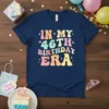 In My 46th Birthday Era text design with colorful retro lettering and small star accents on a navy t-shirt