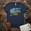 Navy blue t-shirt with "In My Archery Era" text and archery target graphic
