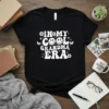 Retro "In My Cool Grandma Era" text design with smiley face and butterflies on a black t-shirt