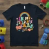 In My Field Day Era retro t-shirt design with rainbow, checkered flag, and sports icons
