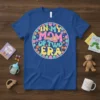 In My Mom of Two Era text design with cute cartoon children, flowers, and hearts on a blue t-shirt