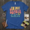 Retro "In My Sophia Era" text design with colorful typography, lotus flower, and butterfly graphic