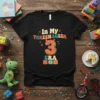 In My Threenageer 3 Era birthday t-shirt with large orange number 3 graphic and colorful text