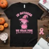 In October We Wear Pink Breast Cancer Awareness T-Shirt with witch hat and cauldron graphic