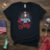 Independence Day of July t-shirt design with an eagle wearing a top hat and fireworks, featuring the text "Independence Day