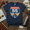 Interstate 55 highway sign design on a navy t-shirt featuring a desert road scene with a sunset