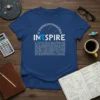 Blue t-shirt with "INTπSPIRE" text, the Pi symbol, and a long string of Pi digits, set against a starry background