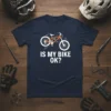 Is My Bike Ok? quote with a bicycle graphic on a navy t-shirt, designed for cyclists and bike lovers