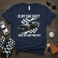 Navy blue t-shirt with white text "IS MY CAR FAST? RACE ME AND FIND OUT" and a graphic of a