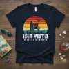 Isla Vista California retro surf sunset t-shirt design with waves, lifeguard tower, and surfboard
