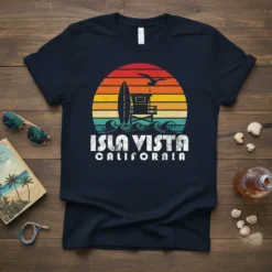 Isla Vista California retro surf sunset t-shirt design with waves, lifeguard tower, and surfboard