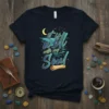 It is well with my Soul quote on a navy blue t-shirt with a serene water, moon, and star graphic