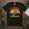 It's Another Half Mile Or So hiking t-shirt design with people trekking mountains at sunset