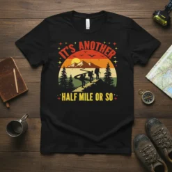 It's Another Half Mile Or So hiking t-shirt design with people trekking mountains at sunset