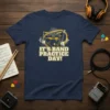 It's Band Practice Day! text design with drums and guitars on a navy t-shirt