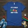 T-shirt with "IT'S FIELD DAY Y'ALL" text and graphics of a soccer ball, cone, water bottle, jump rope, and beanbag