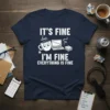 It's Fine I'm Fine Everything Is Fine quote with cartoon coffee cup and laptop on a navy t-shirt