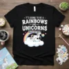 Black t-shirt with "IT'S GOING TO BE A RAINBOWS AND UNICORNS KIND OF DAY" text, a unicorn on a cloud