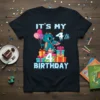 It's My 4th Birthday Dragon T-Shirt design with a cute blue dragon holding balloons and surrounded by gifts, celebrating a