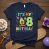 IT'S MY 8 BIRTHDAY text with a smiling avocado character on a skateboard, holding a balloon, on a navy t-shirt