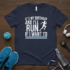 It's My Birthday And I'll Run If I Want To quote on a navy t-shirt with a graphic of a