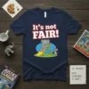 It's not FAIR! text with elephant sliding down a yellow slide and a mouse nearby, navy blue t-shirt design