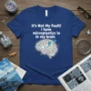 T-shirt featuring the quote "It's Not My Fault! I have microplastics in my brain" with a graphic of a brain