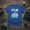 It's Ok I'll Sleep After Strike text and rocket graphic on a blue t-shirt, designed for gamers