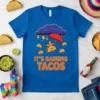 It's Raining Tacos t-shirt design with cute tacos under a cloud and umbrella