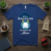 It's A Beautiful Day To Leave Me Alone quote on a navy blue t-shirt, featuring a comfy armchair graphic and