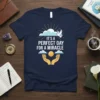 T-shirt with the text "IT'S A PERFECT DAY FOR A MIRACLE" featuring a dove and hands holding a sun graphic