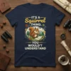 It's A Squirrel Thing You Wouldn't Understand quote on a navy t-shirt with a cartoon squirrel using a magnifying glass